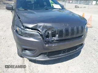 2021 Jeep Cherokee Latitude Lux with VIN 1C4PJMMNXMD153105, listed as a IAAI auction lot 42116047 with 153,011 mi miles and . Bid and sale history available at carsss.com. Image 6.
