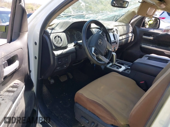 2014 Toyota Tundra 4WD Truck SR5 with VIN 5TFDW5F1XEX390763, listed as a IAAI auction lot 41973864 with 117,369 mi miles. Bid and sale history available at carsss.com. Image 5.