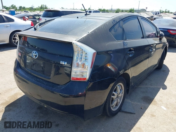2011 Toyota Prius I with VIN JTDKN3DU1B1402339, listed as a IAAI auction lot 42000051 with 226,974 mi miles. Bid and sale history available at carsss.com. Image 4.