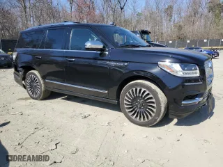 2021 Lincoln Navigator Black Label with VIN 5LMJJ2TT6MEL20329, listed as a Copart auction lot 49008805 with 51,152 mi miles and Salvage Title. Bid and sale history available at carsss.com. Image 4.