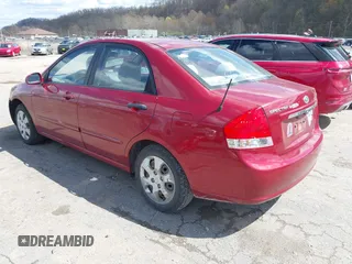 2009 Kia Spectra EX with VIN KNAFE221495665378, listed as a IAAI auction lot 42036945 with 153,254 mi miles. Bid and sale history available at carsss.com. Image 3.