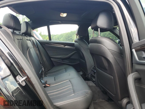 2020 BMW 5 Series with VIN WBAJB1C03LCD19170, listed as a Copart auction lot 64942594 with 66,584 mi miles and Salvage title. Bid and sale history available at DreamBid. Image 10.