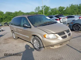 2001 Dodge Caravan Sport with VIN 2B8GP44381R223296, listed as a IAAI auction lot 42139126 with 129,260 mi miles and . Bid and sale history available at carsss.com. Image 1.