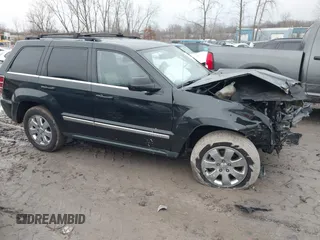 2009 Jeep Grand Cherokee Limited with VIN 1J8HR58T89C541970, listed as a IAAI auction lot 41189623 with 74,161 mi miles. Bid and sale history available at carsss.com. Image 13.