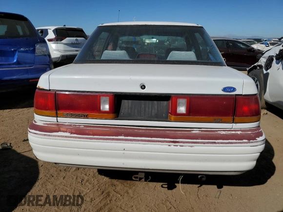1994 Ford Escort z VIN 3FARP13J4RR122084, wystawiony jako Copart lot #73184804 z przebiegiem 238 604 mil mil oraz Nie do naprawy. Historia ofert i sprzedaży dostępna na DreamBid. Obrazek 6.