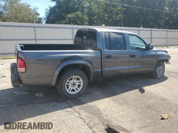 2003 Dodge Dakota Sport with VIN 1D7HL38N43S184708, listed as a Copart auction lot 73320964 with 143,398 mi miles and Salvage Title. Bid and sale history available at carsss.com. Image 3.