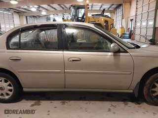 1999 Chevrolet Malibu LS with VIN 1G1NE52M4X6194441, listed as a IAAI auction lot 41577551 with 94,386 mi miles. Bid and sale history available at carsss.com. Image 13.