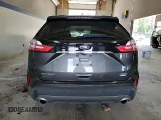 2020 Ford Edge SEL z VIN 2FMPK3J93LBA08227, wystawiony jako Copart lot #57804365 z przebiegiem 57 366 mil mil oraz Szkoda całkowita • Salvage title. Historia ofert i sprzedaży dostępna na DreamBid. Obrazek 6.