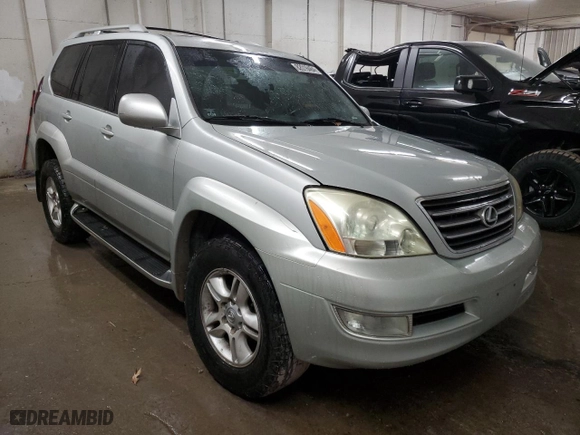 2003 Lexus GX 470 with VIN JTJBT20XX30004874, listed as a Copart auction lot 82016464 with 303,929 mi miles and Salvage Title. Bid and sale history available at carsss.com. Image 4.