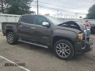 2019 GMC Canyon 4WD Denali with VIN 1GTG6EENXK1200430, listed as a Copart auction lot 65524334 with 54,813 mi miles and Salvage Title. Bid and sale history available at carsss.com. Image 4.