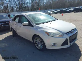 2012 Ford Focus SEL with VIN 1FAHP3H23CL183151, listed as a IAAI auction lot 41800487 with 165,370 mi miles. Bid and sale history available at carsss.com. Image 1.
