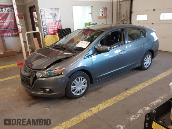2010 Honda Insight LX with VIN JHMZE2H54AS040316, listed as a IAAI auction lot 41572246 with 142,850 mi miles and . Bid and sale history available at DreamBid. Image 17.
