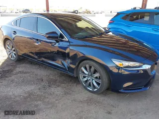 2020 Mazda Mazda6 Touring with VIN JM1GL1VM2L1514941, listed as a IAAI auction lot 41831353 with 154,033 mi miles. Bid and sale history available at carsss.com. Image 1.