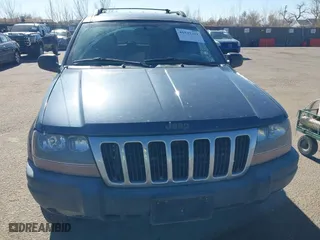 2001 Jeep Grand Cherokee Laredo with VIN 1J4GW48N11C558857, listed as a IAAI auction lot 41527331 with 187,513 mi miles. Bid and sale history available at carsss.com. Image 6.