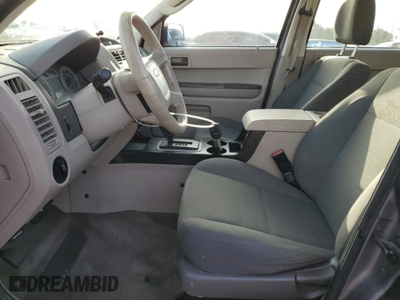 2009 Ford Escape XLS with VIN 1FMCU92749KB94402, listed as a Copart auction lot 60975645 with 171,202 mi miles and Clean title. Bid and sale history available at DreamBid. Image 7.