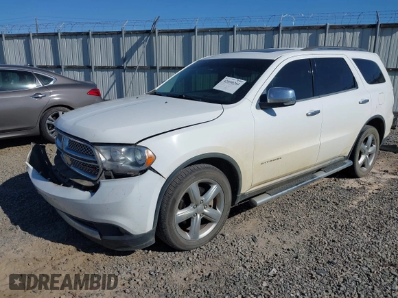 2013 Dodge Durango Citadel with VIN 1C4SDHET0DC571961, listed as a IAAI auction lot 42050261 with 257,637 mi miles and . Bid and sale history available at DreamBid. Image 17.