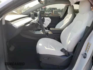 2024 Tesla Model Y Long Range with VIN 7SAYGAEEXRF109995, listed as a Copart auction lot 55160345 with Not provided miles and Salvage title. Bid and sale history available at DreamBid. Image 7.