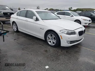 2012 BMW 5 Series 528i with VIN WBAXG5C55CDW85766, listed as a IAAI auction lot 41373727 with 105,056 mi miles. Bid and sale history available at carsss.com. Image 1.