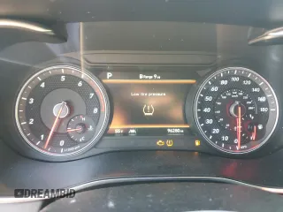 2021 Genesis G70 3.3T with VIN KMTG34LE3MU070581, listed as a Copart auction lot 77118004 with 96,280 mi miles and Salvage Title. Bid and sale history available at carsss.com. Image 9.