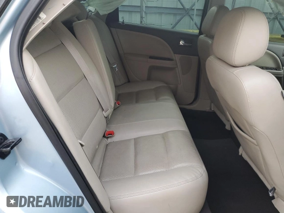 2009 Ford Taurus Limited z VIN 1FAHP25WX9G101791, wystawiony jako Copart lot #56671645 z przebiegiem 120 918 mil mil oraz Nie do naprawy • Non repairable. Historia ofert i sprzedaży dostępna na DreamBid. Obrazek 10.