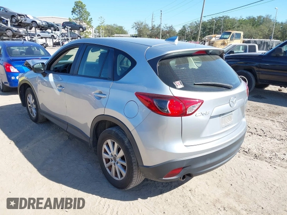 2016 Mazda CX-5 Sport with VIN JM3KE2BE9G0915168, listed as a IAAI auction lot 41482749 with 86,802 mi miles and . Bid and sale history available at carsss.com. Image 3.