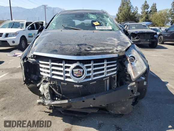 2015 Cadillac SRX Performance Collection с VIN 3GYFNCE38FS607680, выставлен на аукционе Copart как лот 62929235 с пробегом 55 638 миль миль и Списание • Salvage title. История ставок и продаж доступна на DreamBid. Изображение 5.
