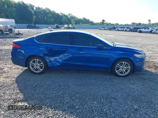 2018 Ford Fusion SE z VIN 3FA6P0H7XJR106776, wystawiony jako IAAI lot #42243361 z przebiegiem 174 000 mil mil oraz . Historia ofert i sprzedaży dostępna na DreamBid. Obrazek 13.