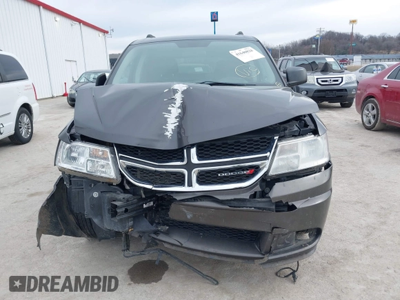 2017 Dodge Journey SE with VIN 3C4PDCABXHT694909, listed as a IAAI auction lot 41640828 with 188,657 mi miles and . Bid and sale history available at DreamBid. Image 12.