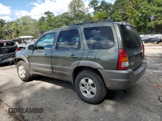 2002 Mazda Tribute LX with VIN 4F2YU09122KM55085, listed as a Copart auction lot 71604184 with 185,158 mi miles and Salvage Title. Bid and sale history available at carsss.com. Image 2.