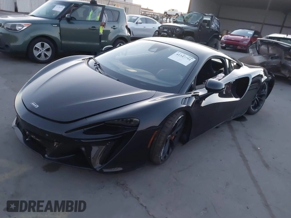 2023 McLaren Artura z VIN SBM16AEA4PW001449, wystawiony jako IAAI lot #41347791 z przebiegiem 4703 mil mil oraz . Historia ofert i sprzedaży dostępna na DreamBid. Obrazek 2.