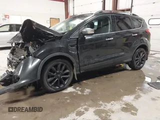 2015 Ford Escape SE with VIN 1FMCU9G91FUC49902, listed as a IAAI auction lot 41947883 with 140,670 mi miles. Bid and sale history available at carsss.com. Image 2.