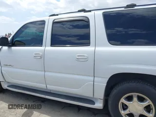 2003 GMC Yukon XL Denali with VIN 1GKFK66UX3J227538, listed as a IAAI auction lot 41915607 with 150,173 mi miles. Bid and sale history available at carsss.com. Image 14.