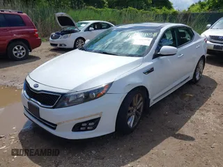 2014 Kia Optima SXL Turbo with VIN 5XXGR4A62EG342201, listed as a IAAI auction lot 42344058 with 108,358 mi miles and . Bid and sale history available at DreamBid. Image 2.
