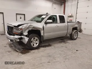 2019 Chevrolet Silverado 1500 LT with VIN 2GCVKPEC1K1212411, listed as a IAAI auction lot 41060633 with 75,508 mi miles and . Bid and sale history available at DreamBid. Image 2.