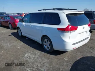 2013 Toyota Sienna LE AAS with VIN 5TDKK3DC2DS354582, listed as a IAAI auction lot 41360766 with 169,978 mi miles. Bid and sale history available at carsss.com. Image 3.
