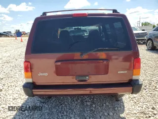 2001 Jeep Cherokee Sport with VIN 1J4FT48S21L538823, listed as a Copart auction lot 56385885 with 157,808 mi miles and Clean title. Bid and sale history available at DreamBid. Image 6.