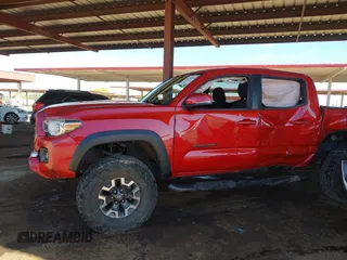 2018 Toyota Tacoma SR with VIN 3TMCZ5AN8JM141486, listed as a IAAI auction lot 42142145 with 54,851 mi miles and . Bid and sale history available at DreamBid. Image 14.