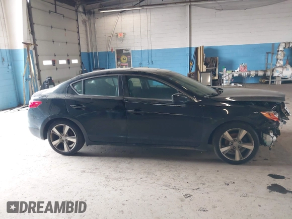 2014 Acura ILX Technology z VIN 19VDE1F71EE005731, wystawiony jako IAAI lot #42279107 z przebiegiem 84 083 mil mil oraz . Historia ofert i sprzedaży dostępna na DreamBid. Obrazek 12.