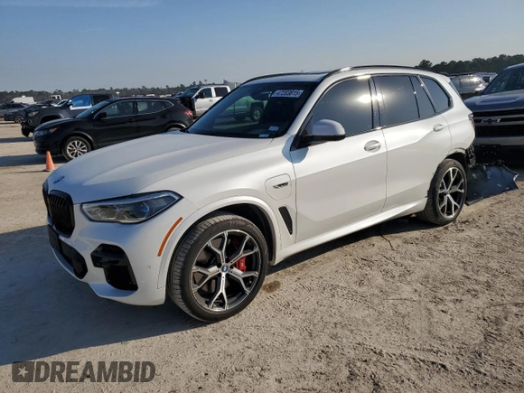 2022 BMW X5 xDrive45e with VIN 5UXTA6C0XN9J37988, listed as a Copart auction lot 47203815 with 27,883 mi miles and Salvage Title. Bid and sale history available at carsss.com. Image 1.