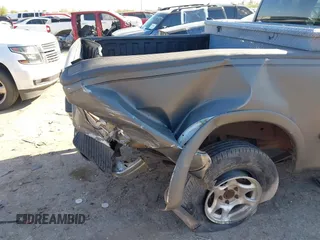 1998 Ford F-150 XL with VIN 1FTRX17LXWKA62592, listed as a IAAI auction lot 41830219 with 172,732 mi miles and . Bid and sale history available at DreamBid. Image 6.