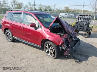 2014 Subaru Forester 2.0XT Premium with VIN JF2SJGDC8EH456485, listed as a IAAI auction lot 42020595 with 122,425 mi miles. Bid and sale history available at carsss.com. Image 1.