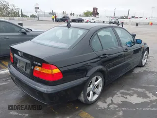 2005 BMW 3 Series 325i with VIN WBAAZ33405KP92833, listed as a IAAI auction lot 42734129 with 123,680 mi miles and . Bid and sale history available at DreamBid. Image 4.