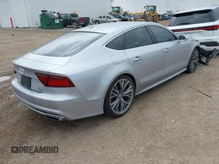 2016 Audi A7 3.0 Prestige with VIN WAU2GAFC0GN103537, listed as a IAAI auction lot 41915392 with 75,879 mi miles. Bid and sale history available at carsss.com. Image 4.