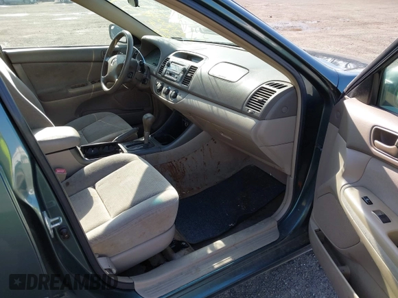 2004 Toyota Camry LE with VIN 4T1BF32K04U074276, listed as a IAAI auction lot 41940050 with 266,420 mi miles and . Bid and sale history available at DreamBid. Image 5.