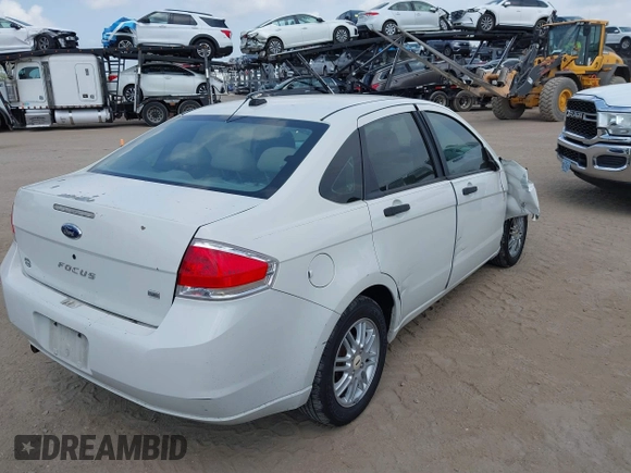 2009 Ford Focus SE with VIN 1FAHP35NX9W203482, listed as a IAAI auction lot 41870714 with 184,823 mi miles. Bid and sale history available at carsss.com. Image 4.