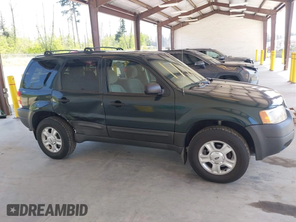 2003 Ford Escape XLT Popular 2 with VIN 1FMCU931X3KC16646, listed as a IAAI auction lot 42160863 with 130,603 mi miles and . Bid and sale history available at DreamBid. Image 13.
