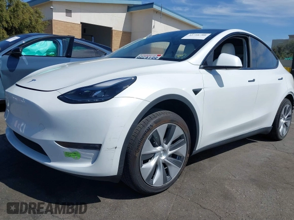 2023 Tesla Model Y Long Range with VIN 7SAYGDEE2PF632121, listed as a IAAI auction lot 41798780 with 53,773 mi miles. Bid and sale history available at carsss.com. Image 2.
