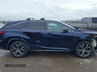 2018 Lexus RX 350L Premium with VIN JTJDZKCAXJ2009962, listed as a IAAI auction lot 41903717 with 100,308 mi miles and . Bid and sale history available at DreamBid. Image 13.