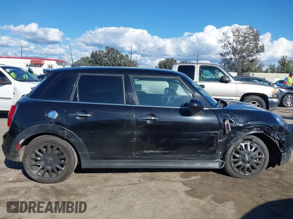 2019 MINI Hardtop 4 Door Cooper S with VIN WMWXU3C58K2H88917, listed as a IAAI auction lot 41750484 with 49,455 mi miles and . Bid and sale history available at DreamBid. Image 13.