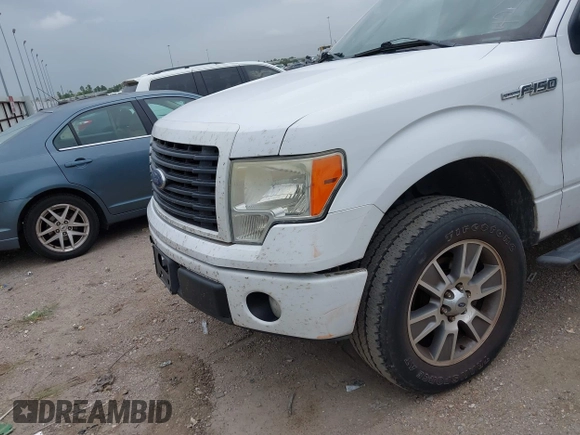 2014 Ford F-150 XL z VIN 1FTFW1CF4EKG46443, wystawiony jako IAAI lot #42783039 z przebiegiem 219 813 mil mil oraz . Historia ofert i sprzedaży dostępna na DreamBid. Obrazek 6.